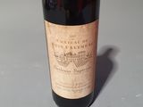 a bottle of wine that is sitting on a table