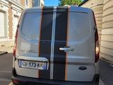 a van that is parked on the side of the road