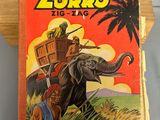un vieux livre pour enfants avec l'image d'un homme chevauchant un éléphant