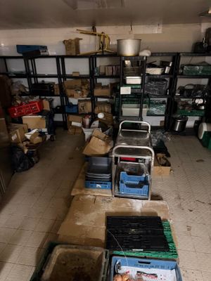 a room filled with lots of boxes and crates