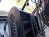 a tread machine that is on the floor in the room