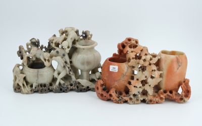 three vases that are sitting next to each other on a table
