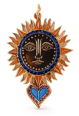 a close up of a sun and a heart on a white background