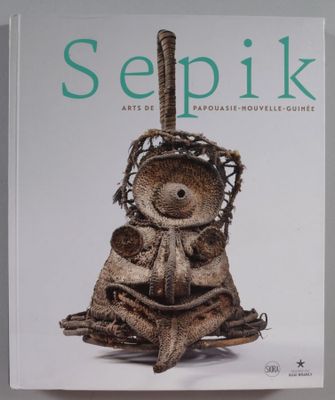 la couverture d'un livre représentant une peluche dans un panier