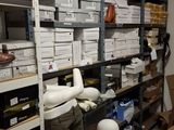 a room filled with lots of boxes and boxes on the shelves