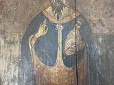 un vieux tableau représentant un homme barbu vêtu d'une robe