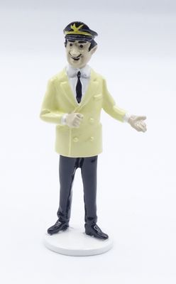 a figurine of a man in a yellow jacket and tie