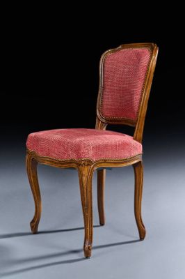 an image of a chair with a red upholstered seat