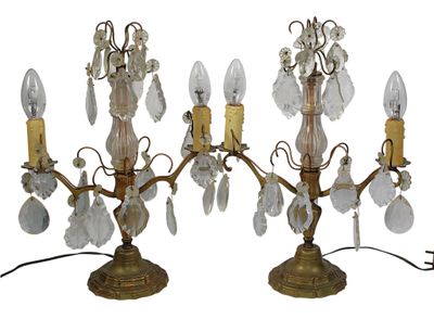 pair of antique brass candelabs with crystal drops