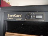 a close up of a black oven with the door open