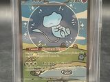 an image of a pokemon card in a clear box