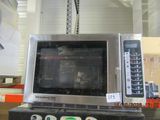 a microwave sitting on top of a counter in a store
