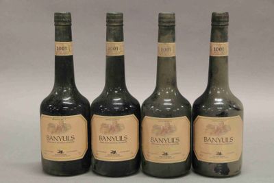 trois bouteilles de vin posées l'une à côté de l'autre sur une table