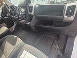 the interior of a truck with a dashboard and steering controls