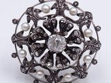 an image of a ring with pearls and diamonds on a white background