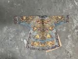 a picture of a blue and gold embroidered jacket