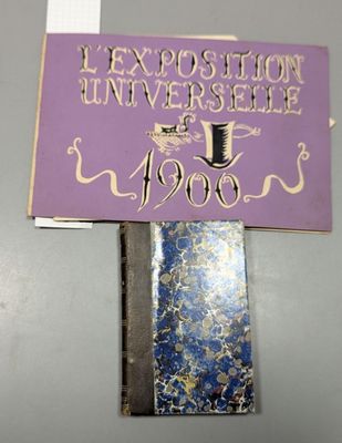 a purple sign with a gold and blue design on it