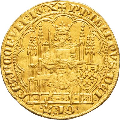 a gold coin with an image of a man on a horse