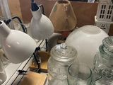 a table with a lot of glass items on it