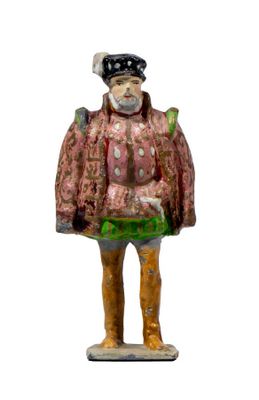 a figurine of a man wearing a hat and coat