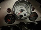 a close up of a gauge on a motorcycle