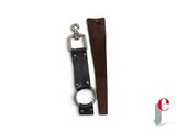 a leather strap with a metal ring attached to it