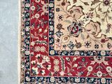 an image of a red and blue rug with a floral design on it