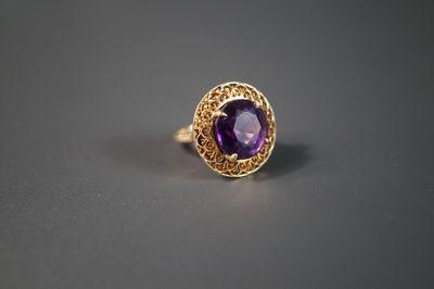 Bague en or jaune 14 carats avec améthorate