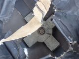 a knife stuck in the side of a piece of luggage