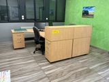 an image of an office with a desk and a chair