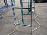 a metal frame that is sitting in the middle of a parking lot