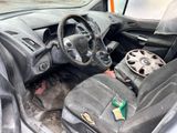 a dirty car with a steering wheel and a steering wheel