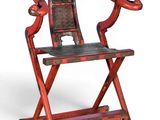 a red chair with a black seat on a white background