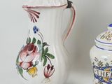 two vases that are next to each other on a table