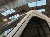 a train that is sitting inside of a building