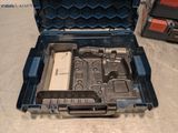 a tool box with a tool in it on the floor