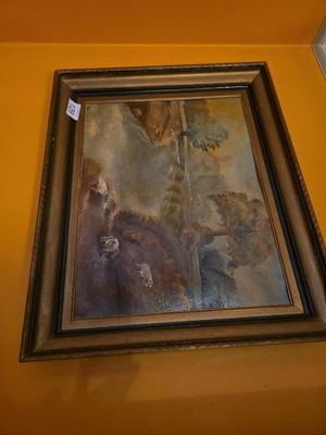 a picture of a painting hanging on a yellow wall