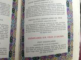 un livre ouvert sur lequel figure l'image d'un tableau