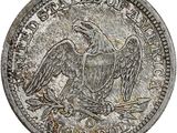 une pièce d'argent sur laquelle est représenté un aigle