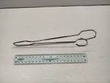 a pair of scissors and a ruler on a table
