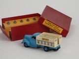 a toy truck with a box on the back of it