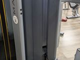 a machine that is sitting on the floor in the gym