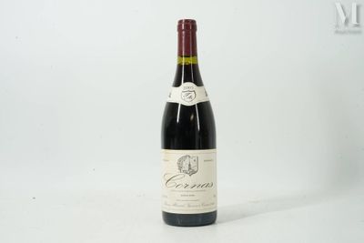 la bouteille de vin est posée sur une surface blanche