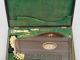 an old musical instrument in a case on a table