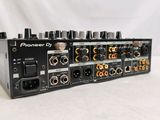 a close up of a mixer with many different knobs on it