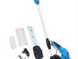 a close up of a corded string trimmer with a cord
