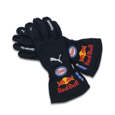 a pair of black gloves with red bull logos on them