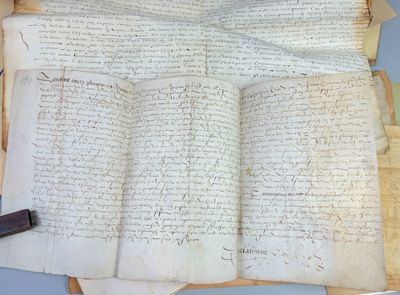 a piece of paper with writing on it and a pen on top of it