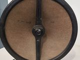 a clock that is sitting on a table in a room