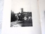an old photo of a castle in the middle of a book